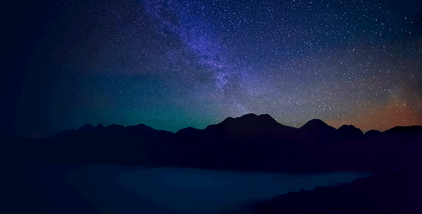 A view of the night sky and horizon
